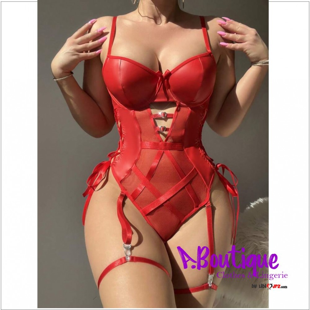 Conjunto de lencería sexy de encaje y malla empalmada con huecos estampados, tanga con lazo lateral y liguero